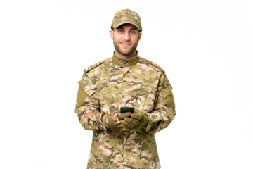 Military man over isolated chroma key background sending a message with the mobile