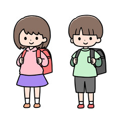 並んで立つ小学生の女の子と男の子