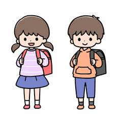並んで立つ小学生の女の子と男の子