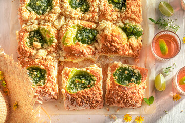 Tasty gooseberry yeast cake served with lemonade.