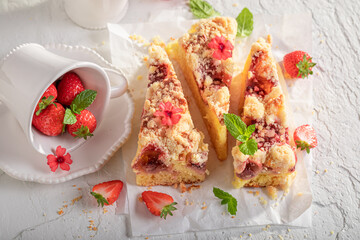 Homemade and sweet strawberry cake with fresh fruits and sugar.