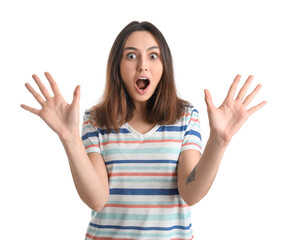 Shocked young woman showing hands on white background