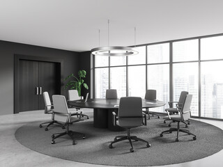 Gray meeting room interior with round table and door