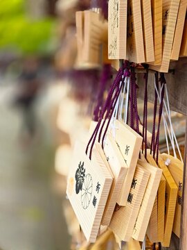Ema - wooden plaques in Japanese temples, in which Shinto and Buddhist worshippers write prayers or wishes. 