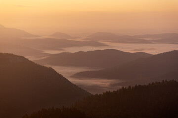 Layers of the hills during morning mist on Bijele stijene mountains, Croatia