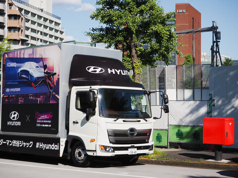 TOKYO, JAPAN - June 16, 2023: A truck promoting Hyundai electric cars and the animated Spiderman movie 'Across the Spider-Verse'. It's in Tokyo's Shibuya area.