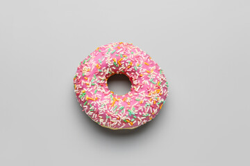 Sweet donut on grey background