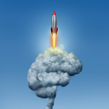 Ambition and Determination and brain power concept as a rocket blasting off as a creative learning and knowledge symbol as a metaphor for brainstorming or learning