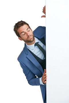 Man, peeking and behind poster or banner mockup for advertising announcement. Curious person or spy at blank board, billboard or coming soon brand logo space isolated on transparent, png background