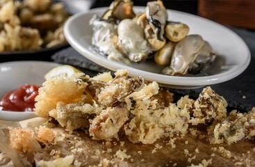 Crispy Delights: Close-Up of Deep-Fried Oysters in 4K Resolution