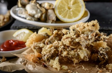 Crispy Delights: Close-Up of Deep-Fried Oysters in 4K Resolution