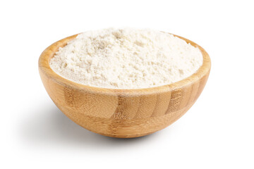 Wooden bowl with wheat flour on white background
