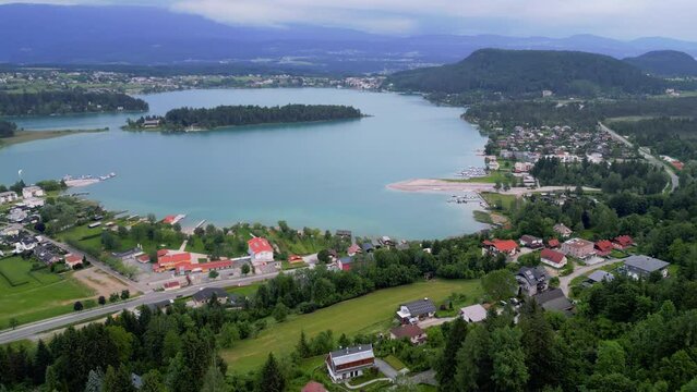 Aerial view over the Faaker See with a view of the beautiful Carinthian landscape