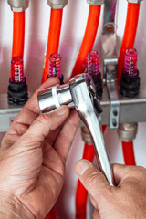 Repair and maintenance of heating systems concept. Specialist inspects. vertical