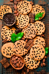 Chocolate chip cookies. On a dark stone background. Space for text.