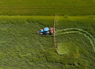 Tractor working on the agricultural field