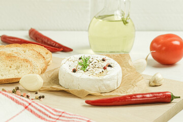 Close-up of French camembert cheese ready to be baked in the oven