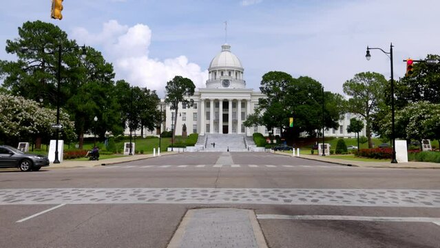 Dexter Avenue and Alabama State Capitol building and traffic in Montgomery, Alabama with stable video.