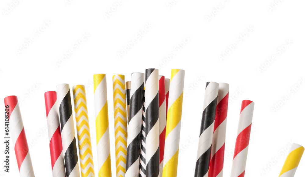 Wall mural different paper drinking straws on white background