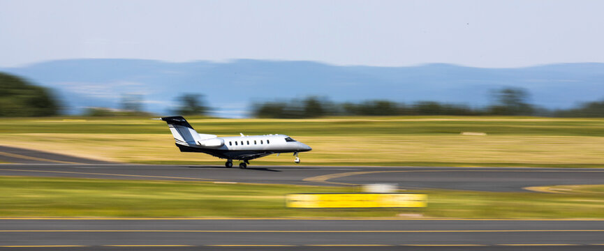 a plain private jet takes off speed panorama