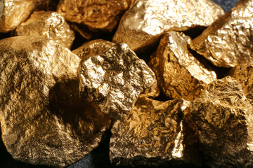 Golden nuggets as background, closeup
