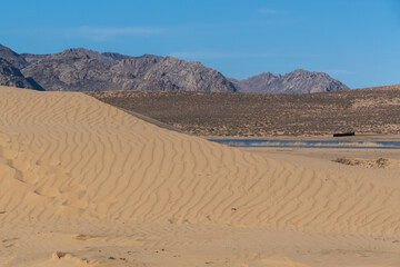 Elsen Tasarkhai or mini-Gobi is located 280km west of Ulaanbaatar in Mongolia, It is a sand dune that stretches 80km long, and 5km wide in Hugnu-Tarna National Park
