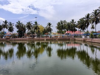Fototapeta na wymiar Pond in Pillayarpatti vinayagar temple