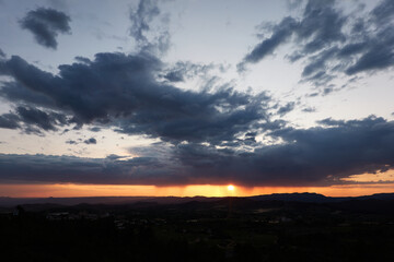 The rain falls on the sunset in the Llaberia Nature Reserve. Tarragona. Catalonia. Spain