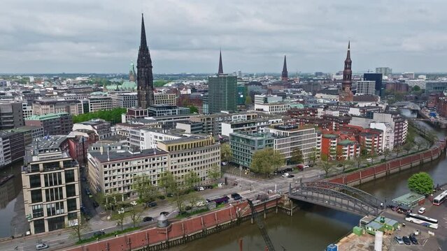 Drone shot revealing Hamburg City Center (Altstadt) , Germany .