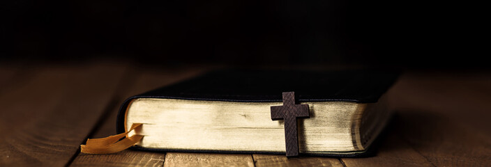cross on book