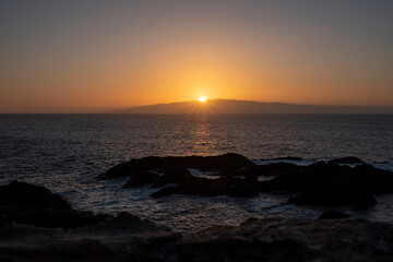 Fototapeta na wymiar Sunset over La Gomera Tenerife Canary island. from Los Gigantes Tenerife