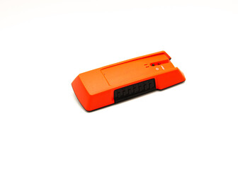 A brand-new battery powered stud finder to locate wood or metal stud edge behind drywall isolated on white background