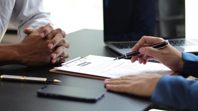 Job interview, job applicant submitting documents are taking exams and interviewing.