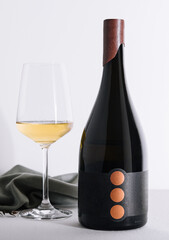 bottle and glass of white wine