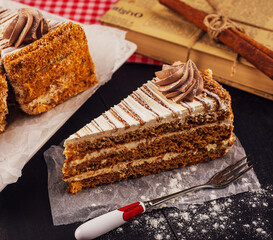 Carrot cake with walnuts and chocolate cream