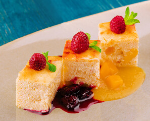 Piece of cottage cheese casserole with cherry jam