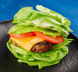 Healthy hamburger wrapped in lettuce