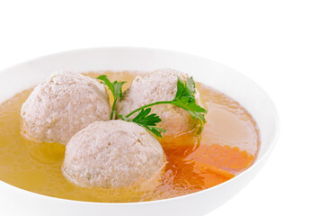 vegetable soup with chicken meatballs in bowl
