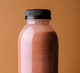 chocolate smoothies milkshake in bottle on chocolate background