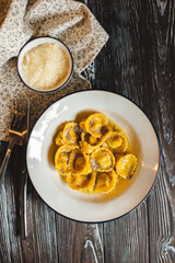 Italian food, menu, cozy kitchen in dark colors, food photography. Atmosphere of Italy.