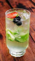 Glass of tasty strawberry cocktail mojito