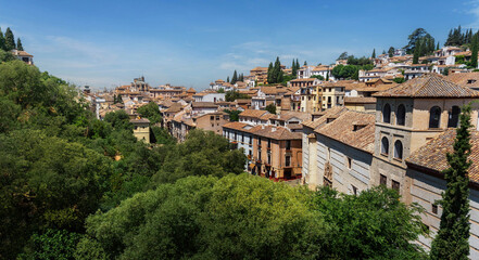 Fototapeta na wymiar Aerial view of Carrera del Darro Street with Cathedral on background - Granada, Andalusia, Spain