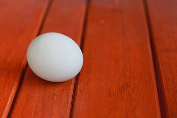 Fototapeta na wymiar duck egg or salted egg isolated on wooden background