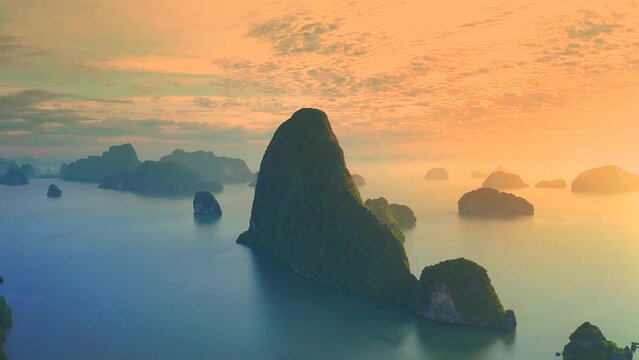 Landscape nature of Samet Nangshe viewpoint is the fantastic limestone formations on the bay with green mangrove forest viewpoint in Phang Nga Bay in sunrise locate at Phang Nga, Thailand