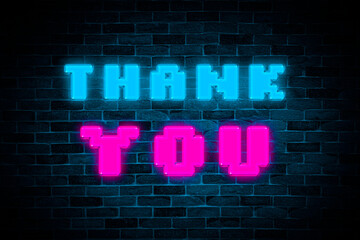 Thank You neon banner on the brick wall background.	
