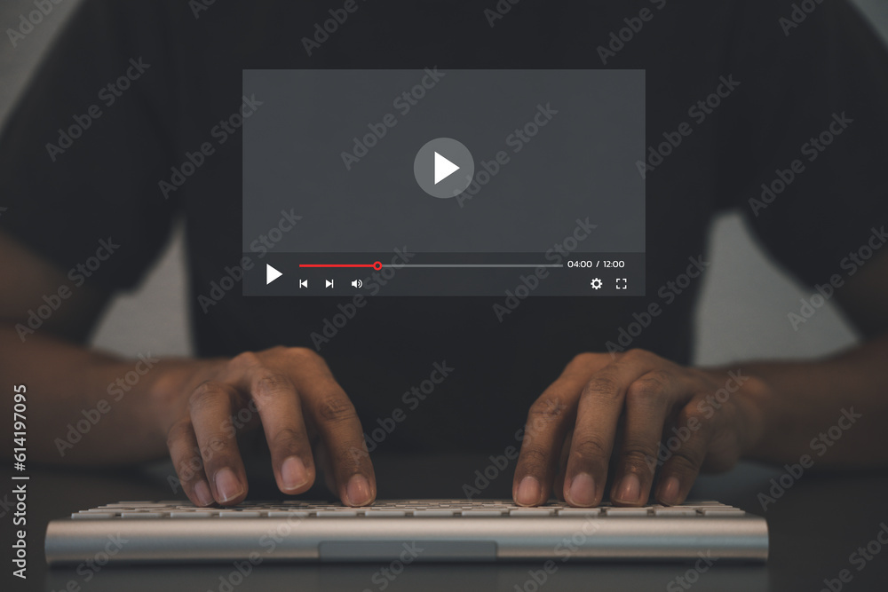 Poster man streaming live content online on virtual screen using keyboard, watching concerts, show, tutoria