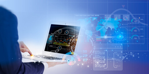 Businessman using digital technology business laptop.