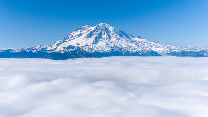 Mount Rainier and High Rock Lookout above the clouds 
