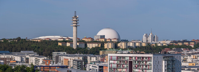 Panorama. The Globe Avicii arena skyscraper apartment houses, a sunny summer morning in Stockholm