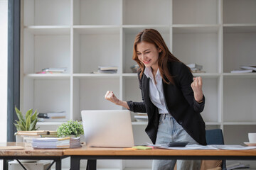 Excited female feeling euphoric celebrating online win success achievement result, young woman happy about good email news, motivated by great offer or new opportunity, passed exam, got a job